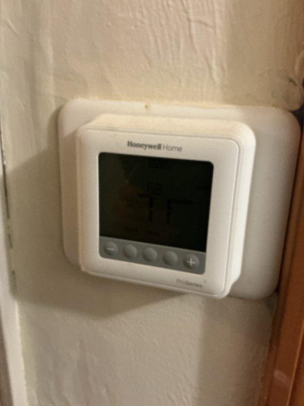 Completed seasonal tune-up on residential HVAC system in preparation for summer cooling season. Performed comprehensive inspection of unit components including electrical connections, capacitor, contactor, and control wiring within the access panel. Verified proper operation of Honeywell Home digital thermostat and system controls, with all components functioning within normal parameters.