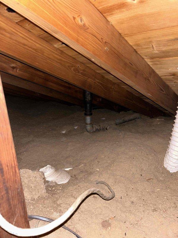 Completed warranty inspection on recent HVAC installation addressing concerns regarding exterior condensation discharge. Verified condensate drain line routing and proper termination at exterior wall, ensuring adequate drainage away from building foundation. Inspected attic space to confirm proper installation of flexible ductwork, verified adequate insulation coverage around HVAC components, and documented all system components operating within manufacturer specifications.