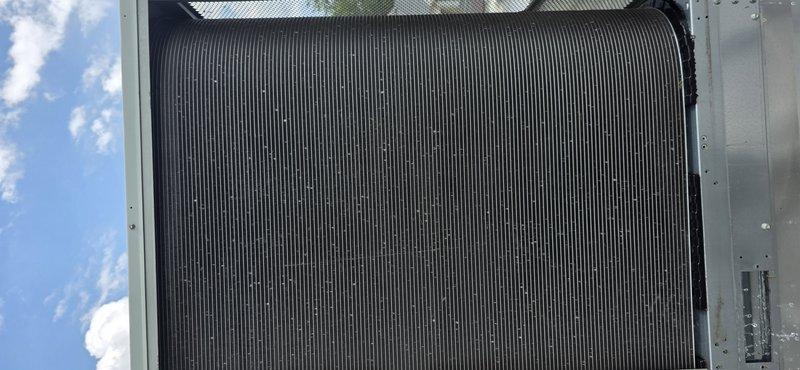 Responded to callback for non-operational unit. Upon arrival, performed visual inspection of outdoor condenser assembly, documenting condition of heat exchanger coil, fan guard, and exterior panels. Coil fins appeared clean and undamaged with no visible obstructions or debris accumulation affecting airflow. All protective components and housing panels were intact and properly secured.