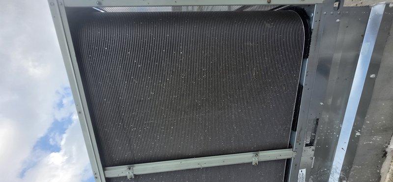 Responded to callback for non-operational unit. Upon arrival, performed visual inspection of outdoor condenser assembly, documenting condition of heat exchanger coil, fan guard, and exterior panels. Coil fins appeared clean and undamaged with no visible obstructions or debris accumulation affecting airflow. All protective components and housing panels were intact and properly secured.