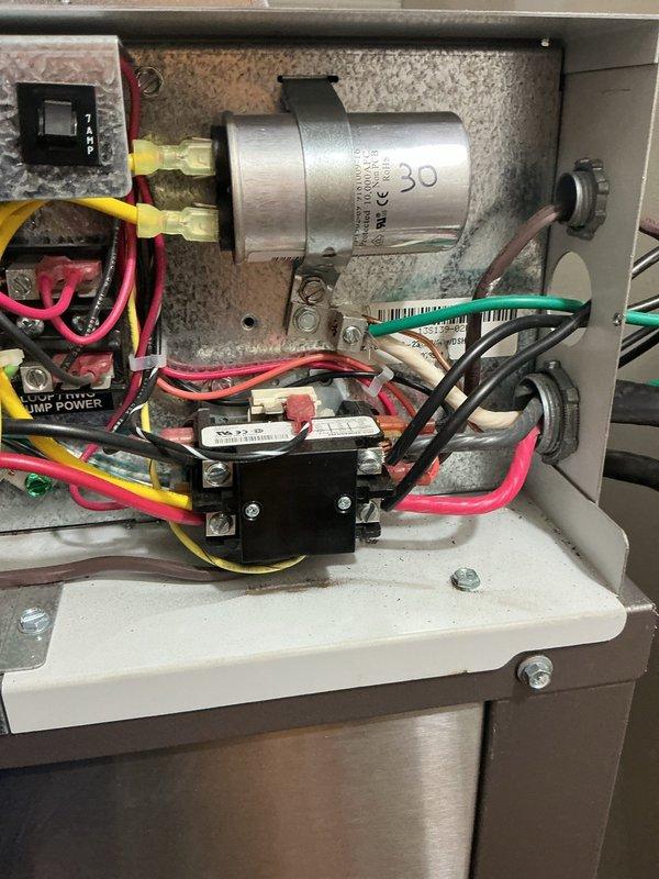 Completed comprehensive cooling maintenance service including condenser coil cleaning, general component inspection, and system evaluation. Inspected electrical control panel components including capacitor, contactor, and relay connections; all wiring found secure with proper terminations. Examined blower motor assembly and housing; noted minor surface rust on housing interior but motor and electrical connections in good operational condition. All system components functioning within normal parameters. Filter size 20x25x5 not included in this service visit.