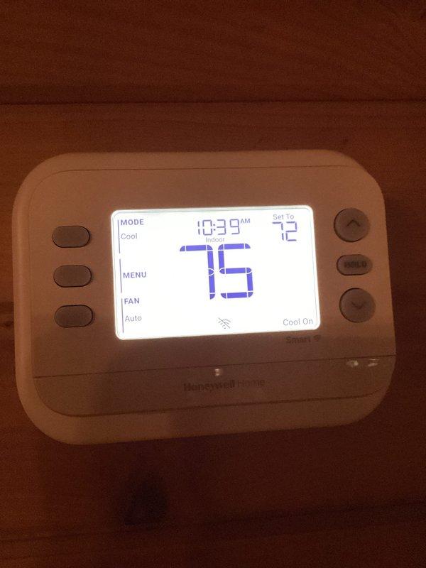 Replaced existing thermostat with new Honeywell Home programmable unit. System tested and verified operational in cooling mode, maintaining proper temperature control with setpoint at 72°F and current reading of 75°F at time of completion.