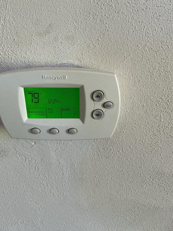Performed routine cooling maintenance on HVAC system. Connected diagnostic gauges to measure system pressures and temperatures, verifying proper refrigerant charge and operational parameters. Thermostat confirmed functioning correctly at 79°F setpoint. System operating within normal specifications with no deficiencies noted.