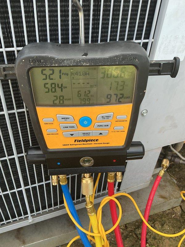 Performed routine cooling maintenance on HVAC system. Connected diagnostic gauges to measure system pressures and temperatures, verifying proper refrigerant charge and operational parameters. Thermostat confirmed functioning correctly at 79°F setpoint. System operating within normal specifications with no deficiencies noted.