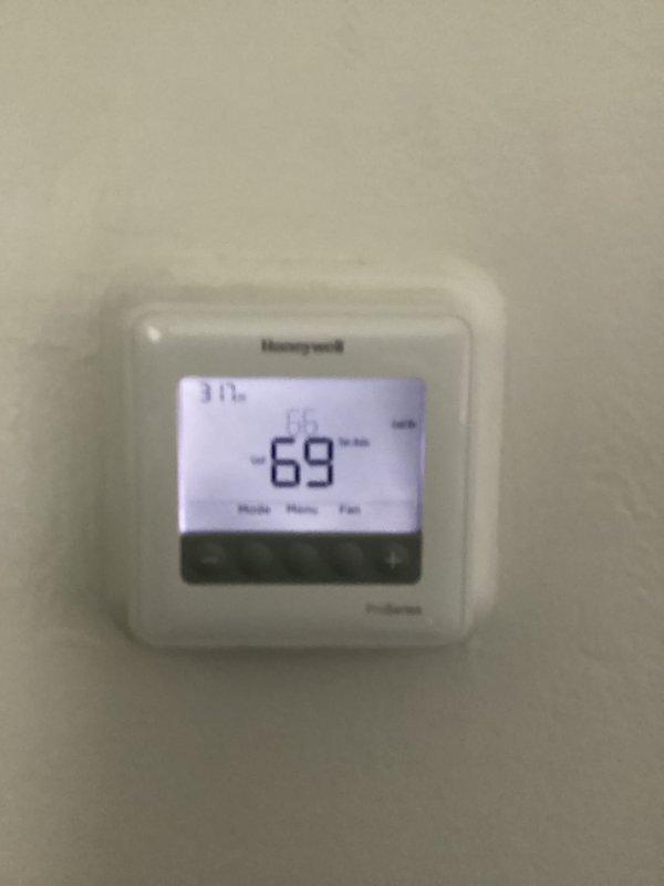 Completed comprehensive cooling system maintenance including filter replacement with 16x20x1 filter. Verified thermostat operation and confirmed system maintaining proper setpoint of 69 degrees with accurate temperature control and display functionality.