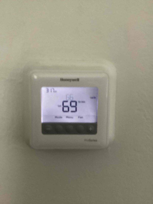 Completed comprehensive cooling system maintenance including filter replacement with 16x20x1 filter. Verified thermostat operation and confirmed system maintaining proper setpoint of 69 degrees with accurate temperature control and display functionality.