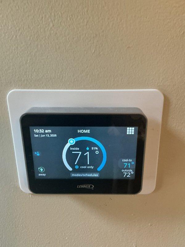 Completed comprehensive cooling and heating maintenance service on Lennox HVAC system. Performed system inspection, verified thermostat operation displaying 71°F cooling setpoint with outdoor temperature at 72°F, and inspected electrical components including capacitor, control board, and wiring connections within outdoor unit. System maintenance contract extended through August 2026, with 20x20x4 filter size noted for future reference.