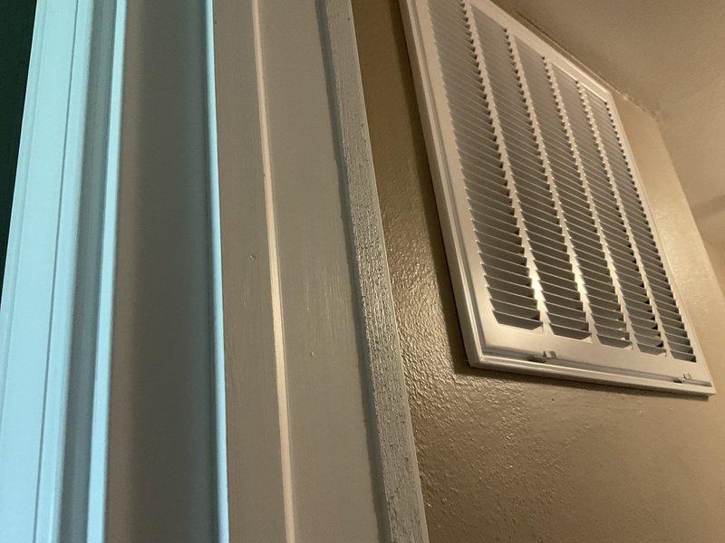 Responded to service call for non-operational HVAC system. Upon arrival, inspected existing Tempstar furnace unit installed in utility area and evaluated overall system condition including ductwork, ventilation components, and air return grille. Documented equipment specifications and installation configuration to provide comprehensive replacement estimate for new heating and cooling system.
