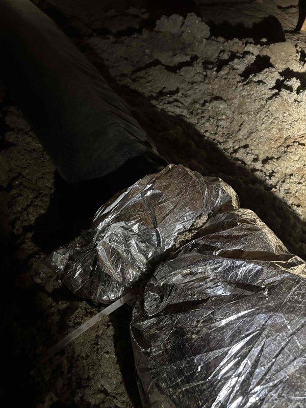 Completed HVAC installation work in crawl space to improve indoor air quality and system performance. Upsized existing ventilation ductwork and installed new return air duct using flexible metallic ductwork with proper support and routing around structural posts. All ductwork was properly sealed and insulated to prevent air leakage and maintain system efficiency in the unconditioned space.
