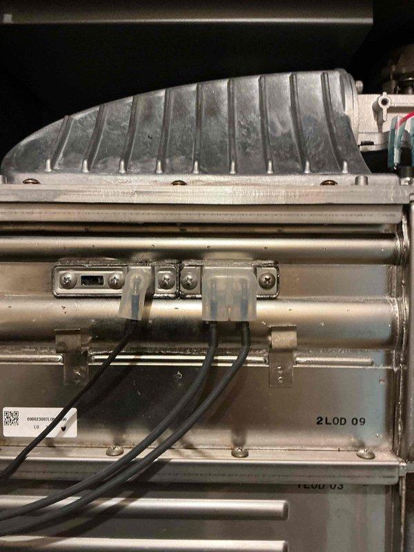 Completed annual plumbing inspection and performed furnace maintenance by replacing a corroded flame rod and igniter assembly. During the inspection, identified significant oxidation and rust staining on the existing flame sensor components, which were exhibiting signs of failure that could compromise system safety and heating efficiency. Removed the deteriorated flame rod assembly showing extensive corrosion and water damage on both the white plastic housing and metal mounting bracket.

Installed new flame rod and igniter components to restore proper furnace operation and ensure reliable ignition sequence. Verified all electrical connections to the new igniter assembly and confirmed proper flame sensing capability. Inspected heat exchanger for cracks or deterioration, noting the ribbed curved design showed normal operational wear with minor dust accumulation. Examined burner tubes and gas manifold assembly for proper alignment and cleanliness.

Checked all plumbing connections under s