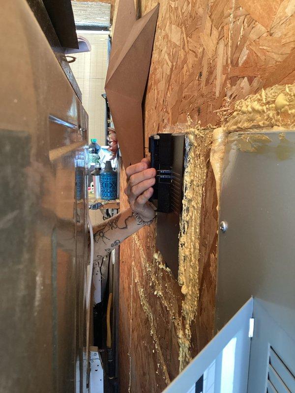 Responded to service call for inground pool heating system with reported leak. Upon inspection, discovered significant water damage to wooden structural elements in basement/mechanical area, with deteriorated OSB sheathing indicating prolonged moisture exposure. Documented existing plumbing infrastructure including PVC drainage lines, copper supply lines, and utility equipment to assess leak source and potential HVAC system impacts related to pool heater installation.