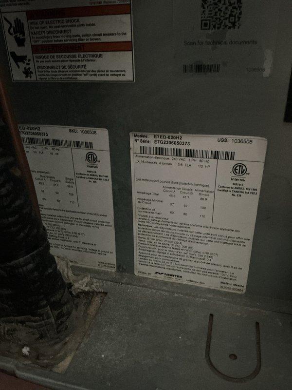 Completed comprehensive tune-up service on residential HVAC system approximately two years old. Performed standard maintenance procedures including inspection of air handler components, return air filtration system, and exterior condensing unit with verification of manufacturer specifications and safety labels. All equipment found to be in good operating condition with proper airflow through return vent grille and secure plumbing connections at base of unit.