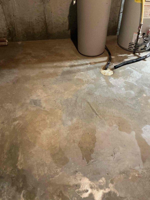 Completed replacement of existing sump pit installation in concrete basement floor, including removal of old pit and installation of new sump basin with pump assembly. Installed new PVC discharge piping system with appropriate check valve and secured all vertical piping to ensure proper drainage function. Connected electrical wiring to pump unit and verified operational performance, ensuring proper float switch activation and discharge capacity to protect basement from water intrusion.