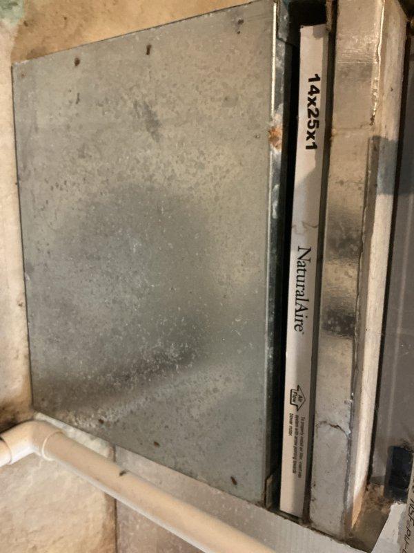 Completed annual cooling system maintenance visit. Verified thermostat operation showing 76°F current temperature with setpoint at 71°F, inspected air handler access panel and filter location, and confirmed system components are accessible for routine service. Included 14x25x1 filter as part of preventative maintenance program.