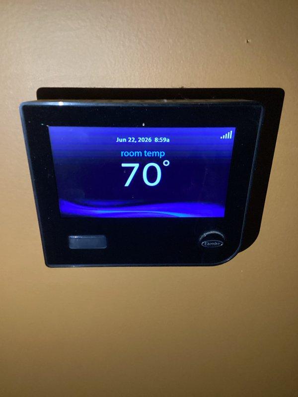 Performed complimentary preventive maintenance tune-up on HVAC system as part of new maintenance agreement enrollment. Inspected thermostat operation and verified proper temperature display and programming functionality. Examined blower assembly components including housing and heat exchanger fins, confirming clean condition and proper mechanical operation of all accessible system components.