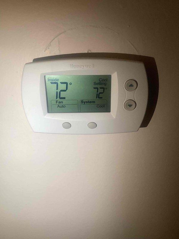 Completed monthly preventive maintenance on residential cooling system. Performed refrigerant pressure diagnostics using manifold gauges at outdoor condenser unit, verified system operating at setpoint of 72°F with thermostat in auto fan mode, and replaced 20x20x1 air filter to maintain optimal airflow and system efficiency.