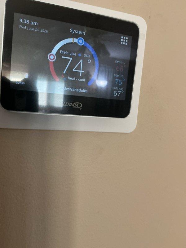 Completed basic monthly cooling maintenance on Bryant air conditioning system. Performed standard inspection of outdoor condensing unit, verified proper operation of compressor and condenser fan motor, checked refrigerant levels, and inspected electrical connections. Confirmed Lennox thermostat displaying proper temperature readings and functioning correctly in cooling mode at 74°F setpoint. Unit operating within normal parameters with no issues identified.
