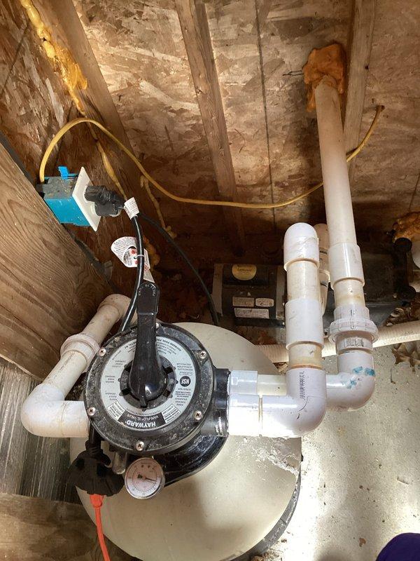 Replaced failed heat exchanger on pool heat pump system located in crawl space. Removed old heat exchanger assembly, installed new unit, and reconnected all PVC plumbing connections to restore proper operation. System tested and verified operational upon completion.