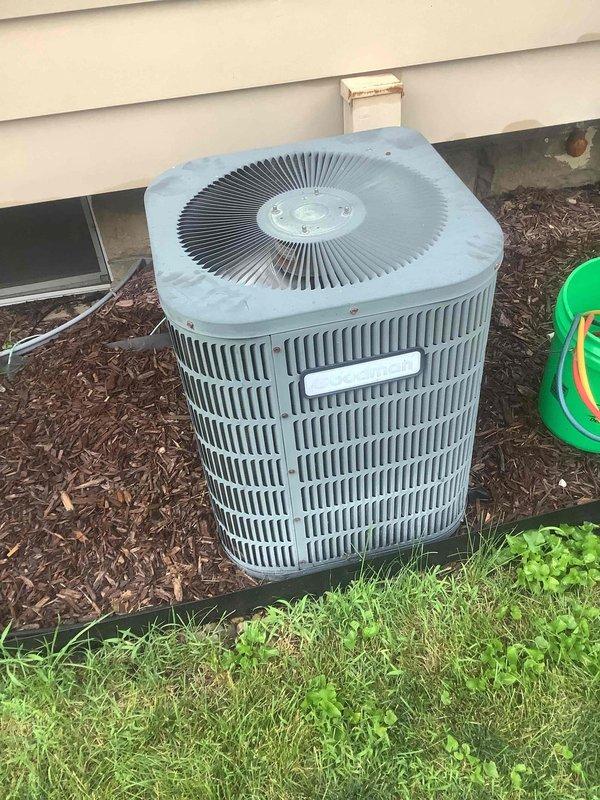 Completed basic monthly cooling maintenance visit on residential HVAC system. Inspected Honeywell digital thermostat confirming proper operation with system cooling at 73 degrees setpoint, verified fan and system controls functioning in auto mode. Performed exterior inspection of condenser unit, checked fan grille and louver condition, confirmed unit operational with no visible refrigerant leaks or mechanical issues, and replaced 16x25x1 air filter per maintenance agreement.