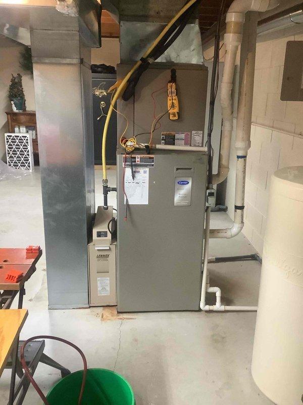 Completed basic monthly maintenance on two residential HVAC cooling systems. Performed comprehensive inspection of both units including Carrier furnace with air handler located in basement mechanical room. Replaced 16x25x4 air filter to maintain proper airflow and system efficiency. Verified Carrier Infinity thermostat operation and confirmed temperature settings holding at 74 degrees. All equipment operating within normal parameters with no deficiencies noted.