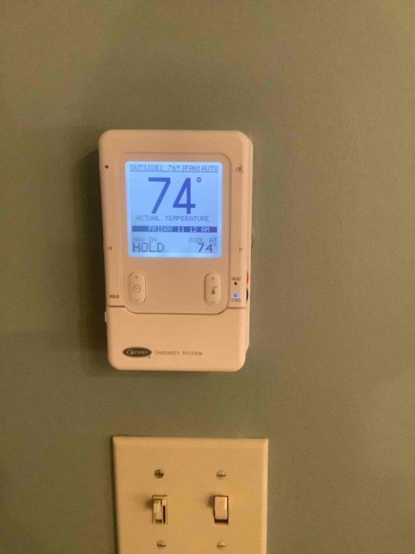 Completed basic monthly maintenance on two residential HVAC cooling systems. Performed comprehensive inspection of both units including Carrier furnace with air handler located in basement mechanical room. Replaced 16x25x4 air filter to maintain proper airflow and system efficiency. Verified Carrier Infinity thermostat operation and confirmed temperature settings holding at 74 degrees. All equipment operating within normal parameters with no deficiencies noted.