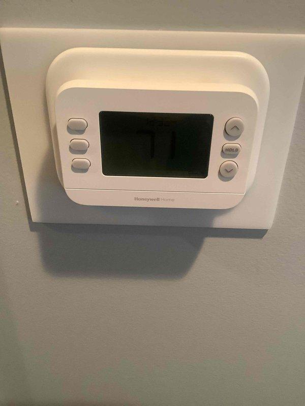 Completed basic monthly cooling maintenance on residential air conditioning system. Replaced 15x21x1 air filter at indoor air handler unit. Inspected outdoor condenser unit, verified fan operation and refrigerant line connections, and confirmed thermostat functionality with no issues observed.