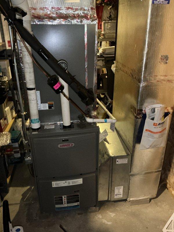 Completed basic monthly cooling maintenance visit on Lennox HVAC system. Inspected indoor furnace and air handler unit in basement mechanical room, verifying proper operation of all components and checking condensate drainage system. Proceeded to outdoor condenser unit, inspected external condition, confirmed adequate airflow through louvered panels and top grille assembly, and verified unit is operating within normal parameters. Replaced 20x25x1 air filter as part of routine maintenance. All equipment functioning properly with no issues identified during inspection.