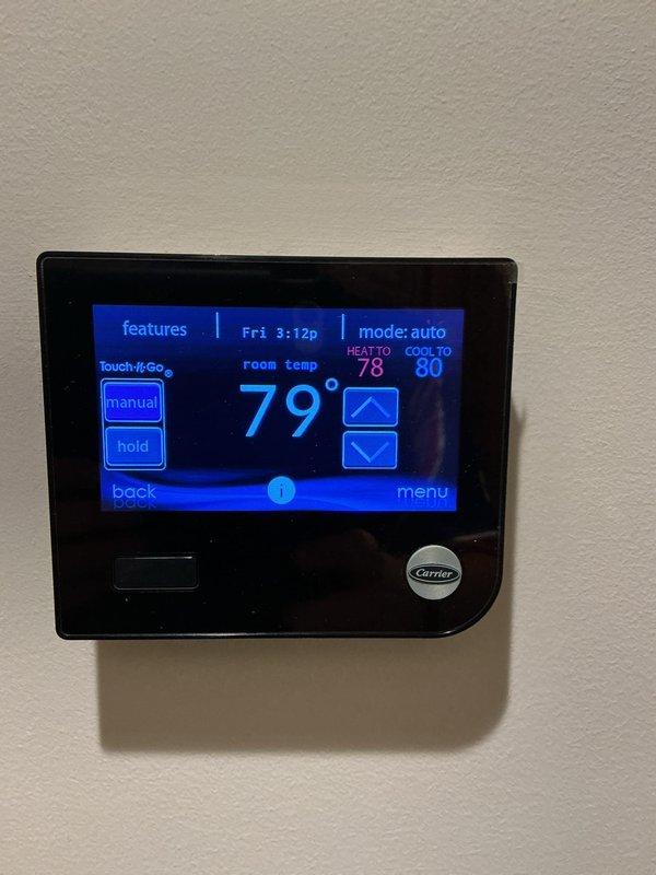 Completed Comfort Care preventive maintenance on residential cooling system. Performed comprehensive inspection of outdoor condenser unit, verified proper refrigerant levels, checked electrical connections, and tested thermostat operation. System currently operating in auto mode with cooling setpoint at 80°F and heating setpoint at 78°F, maintaining indoor temperature of 79°F at time of service.