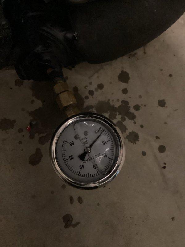 Responded to service call for geothermal AC unit with frozen evaporator coil. Upon arrival, performed system diagnostics and pressure testing using manifold gauges to assess refrigerant levels and system performance. Identified low refrigerant charge as primary cause of coil freezing, thawed coil, and restored unit to normal operating condition.