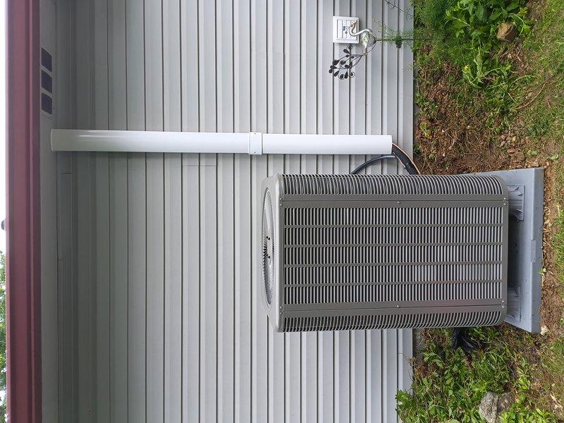 # HVAC Install - Complete System

Successfully completed installation of a Lennox heat pump system at residential property. Mounted outdoor condensing unit on concrete pad against exterior wall with proper clearances and secure mounting. Installed electrical disconnect box and ran appropriate conduit for power supply to unit. Routed refrigerant lines and condensate drain using PVC piping with professional mounting brackets along building exterior. Verified system operation and confirmed indoor temperature reading of 73°F using calibrated digital thermometer. All components properly secured, leveled, and positioned for optimal performance and serviceability. Installation meets manufacturer specifications and local code requirements.