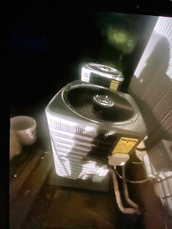 Responded to no cooling complaint on residential air conditioning system. Accessed control board compartment and inspected electrical connections, wiring harnesses, and control components. Verified proper wiring connections at terminal board with multiple low-voltage control wires secured with wire nuts. Inspected attic-mounted condenser unit including fan motor operation, condenser coil condition, and refrigerant line connections. System evaluated and restored to proper cooling operation.