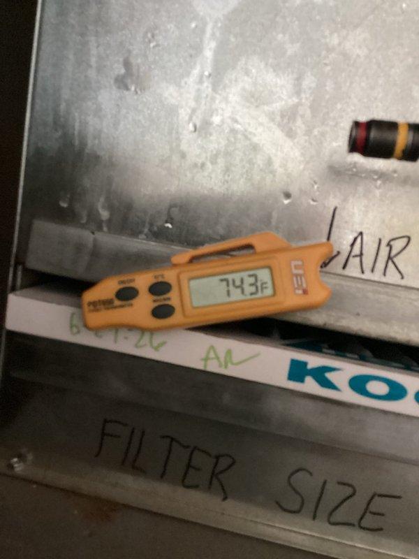 Responded to service call for air conditioning unit running continuously with loud operational noise and shotgun-like sound upon shutdown. Performed system diagnostic and temperature verification, measuring supply air temperature at 74.3°F at the air handler. Inspected thermostat operation and system cycling behavior to identify source of excessive noise and hard shutdown symptoms.