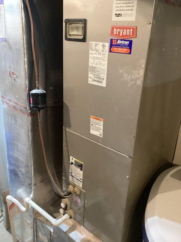 Responded to callback for cooling system not maintaining temperature following recent maintenance visit. Upon arrival, verified thermostat reading of 82°F indicating inadequate cooling performance. Inspected Bryant air handler unit and associated components including refrigerant lines, filter drier, and condensate drain system. All equipment found operating within normal parameters with no visible defects or system malfunctions identified.