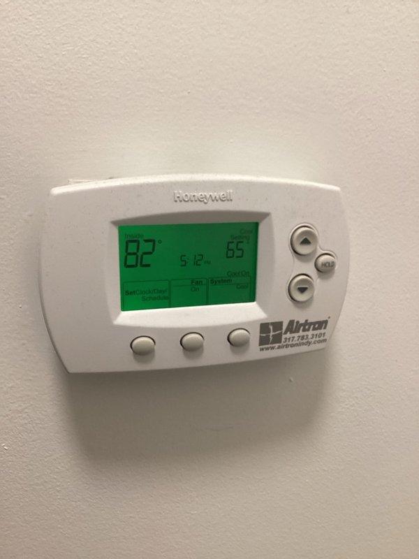 Responded to callback for cooling system not maintaining temperature following recent maintenance visit. Upon arrival, verified thermostat reading of 82°F indicating inadequate cooling performance. Inspected Bryant air handler unit and associated components including refrigerant lines, filter drier, and condensate drain system. All equipment found operating within normal parameters with no visible defects or system malfunctions identified.
