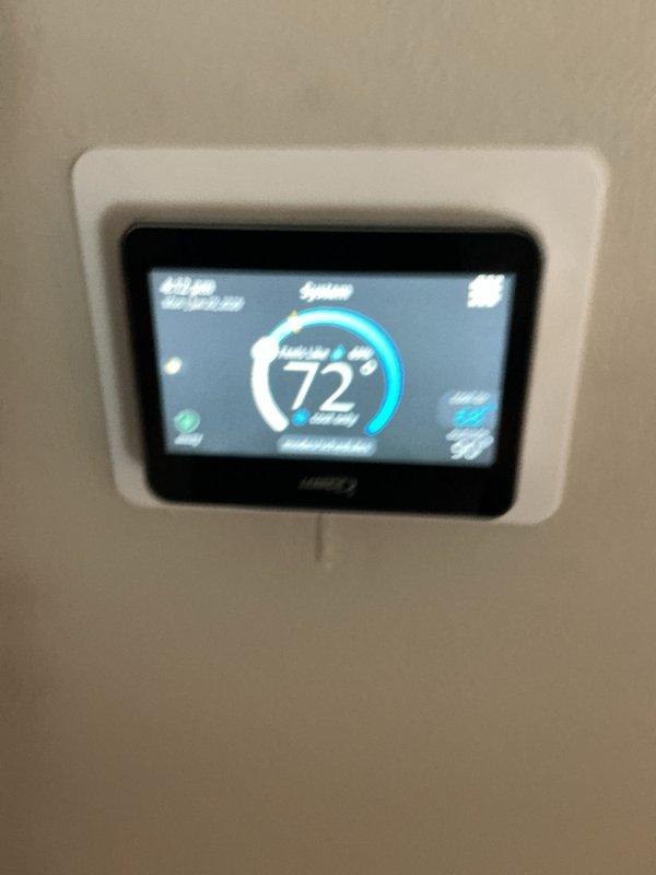 Completed basic monthly cooling system maintenance on Lennox outdoor condensing unit. Performed standard diagnostic checks with refrigerant gauges, verified thermostat operation showing 72°F setpoint, inspected refrigerant lines and condensate drain, and replaced 20x20x1 air filter per service agreement requirements.