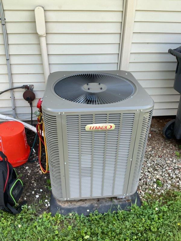 Completed basic monthly cooling system maintenance on Lennox outdoor condensing unit. Performed standard diagnostic checks with refrigerant gauges, verified thermostat operation showing 72°F setpoint, inspected refrigerant lines and condensate drain, and replaced 20x20x1 air filter per service agreement requirements.
