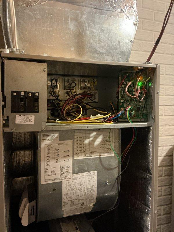 Completed basic monthly cooling maintenance visit on HVAC system. Inspected evaporator coil and found significant accumulation of dust, dirt, and debris on fins and surrounding surfaces, which can reduce system efficiency and airflow. Documented electrical panel condition showing proper wiring connections, circuit breakers, contactors, and control board operation.
