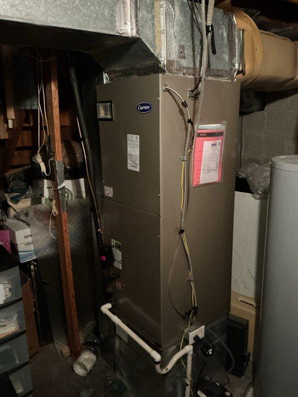 Completed monthly maintenance on Carrier cooling system including indoor air handler and outdoor condensing unit. Replaced 20x20x4 air filter, inspected equipment operation, and verified system performance with gauges connected to outdoor unit. All components operating within normal parameters.