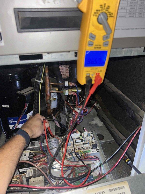 Responded to service call for geothermal system struggling to maintain temperature. Performed diagnostic evaluation using pressure gauges to check refrigerant levels and utilized digital multimeter to test electrical components and circuit boards within the unit. System assessment indicated potential low refrigerant charge requiring further evaluation and possible recharge to restore proper cooling capacity.
