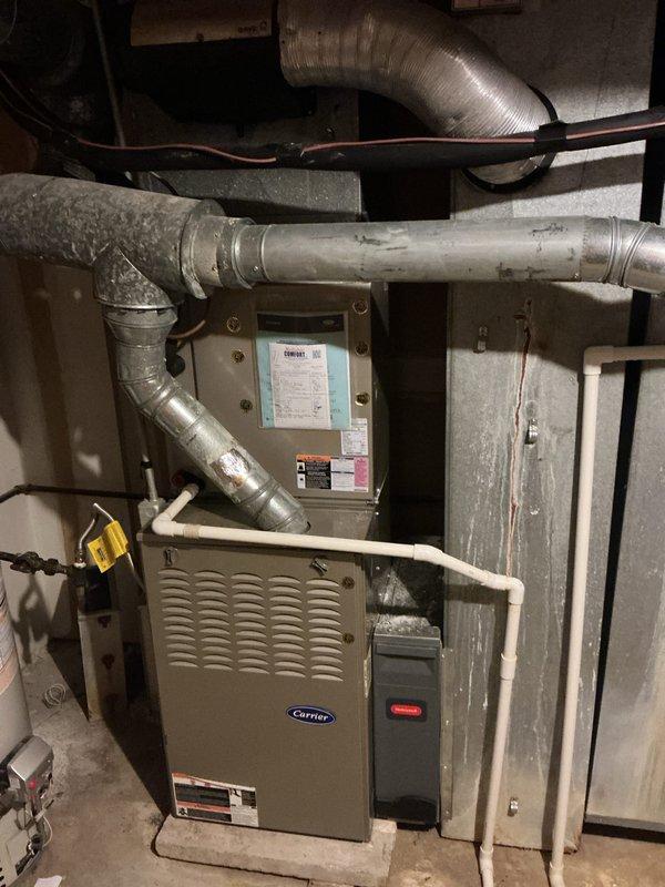 # HVAC Maintenance - Cooling System Service

Completed monthly basic cooling maintenance visit on Carrier furnace system with integrated cooling capabilities. Replaced 20x25x4 air filter as part of recurring preventive maintenance program. Verified thermostat operation showing system in cooling mode with fan running continuously at 73°F with permanent hold setting engaged. Inspected ductwork connections, insulated refrigerant lines, and overall system components for proper operation. All equipment found operating within normal parameters with no deficiencies noted during this scheduled maintenance visit.