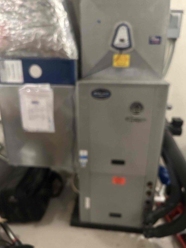 Responded to cooling complaint for upstairs unit. Inspected Carrier air handler system and verified thermostat operation showing 76°F on hold setting in cooling mode. Performed diagnostic evaluation of equipment and ductwork to identify cause of inadequate cooling performance.