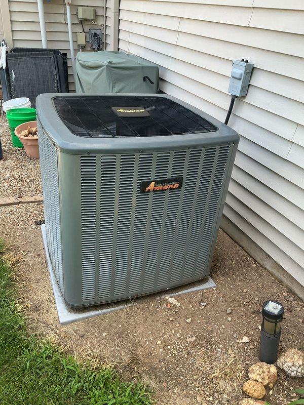 Completed monthly Basic Cooling Visit on Amana outdoor condenser unit. Performed standard maintenance inspection of cooling system, verified unit operation, and documented equipment condition with photos. System operating within normal parameters at time of service.