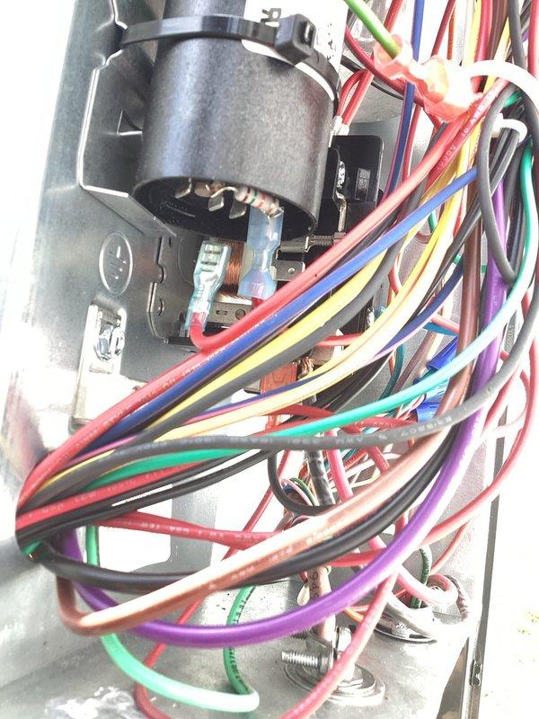 Responded to no cooling or heating complaint on recently installed heat pump system. Customer reported outdoor unit clicking and buzzing like a relay for 15-20 minutes with fan running but compressor failing to start, resulting in extended run times over past two weeks. Upon inspection, diagnosed faulty start components in outdoor unit. Accessed electrical control panel and identified defective contactor causing repetitive clicking sound without engaging compressor. Replaced failed contactor and verified proper electrical connections throughout control assembly. Tested system operation through complete heating and cooling cycles. Compressor now engaging properly without delay, eliminating clicking and buzzing sounds. Confirmed normal run times and proper temperature differential across coil. Checked air filter condition during service call, found 18x20x1 filter clean with adequate airflow. System restored to full operational capacity with both heating and cooling functions operating as