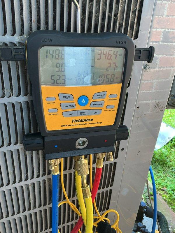Completed CCC Basic Monthly maintenance service on residential cooling system. Replaced 20x25x4 air filter as part of routine preventive maintenance. Connected Fieldpiece SMAN refrigerant manifold gauge to outdoor condensing unit and recorded system operating pressures and temperatures across multiple zones, with readings indicating proper refrigerant charge levels. Inspected condenser coil fins and found them in good condition with adequate airflow capacity. All system components operating within normal parameters at time of service.