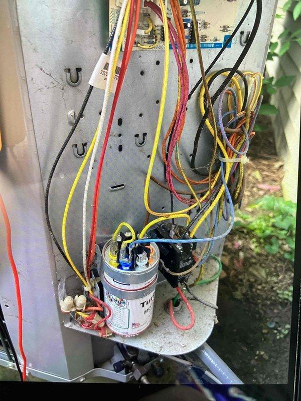 Responded to no-cooling call at residential property. Upon arrival, inspected outdoor condensing unit and accessed electrical components including capacitor, control board, and wiring connections. Diagnosed system failure, performed necessary repairs to restore cooling operation, and verified proper system function before departure.