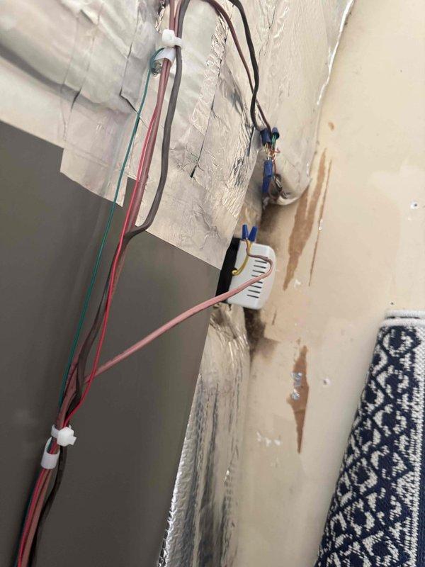 Responded to callback regarding condensation concerns on recently installed Lennox air handler system. Inspected unit and ductwork installation, verified proper insulation application on supply and return ducts with foil-faced wrap, confirmed PVC condensate drain lines are properly installed and pitched for drainage. Examined thermostat wiring installation and connections, verified all low-voltage wiring is properly secured and terminated. System operating within normal parameters with no evidence of abnormal condensation or moisture issues at equipment or ductwork.
