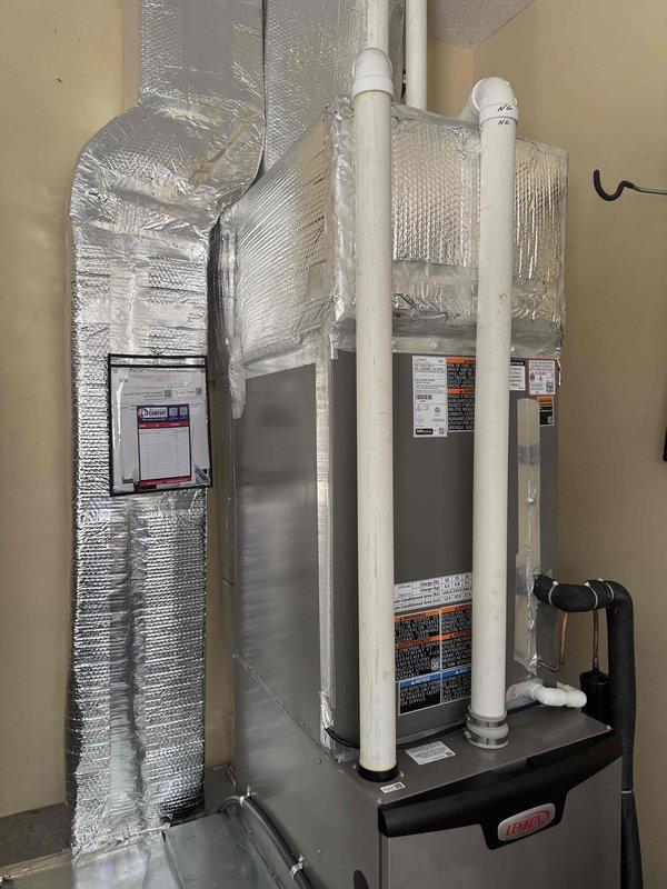 Responded to callback regarding condensation concerns on recently installed Lennox air handler system. Inspected unit and ductwork installation, verified proper insulation application on supply and return ducts with foil-faced wrap, confirmed PVC condensate drain lines are properly installed and pitched for drainage. Examined thermostat wiring installation and connections, verified all low-voltage wiring is properly secured and terminated. System operating within normal parameters with no evidence of abnormal condensation or moisture issues at equipment or ductwork.