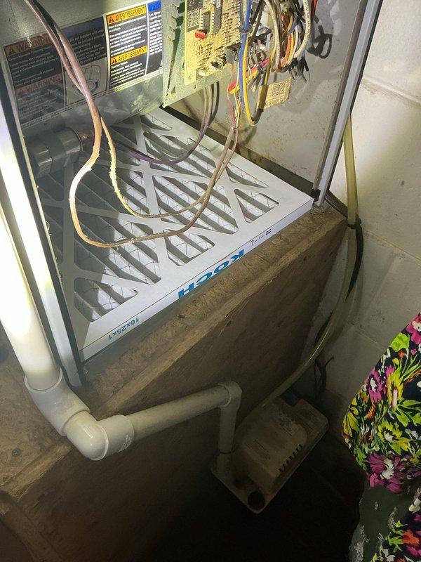 Completed basic monthly cooling maintenance visit on residential HVAC system. Measured supply air temperature at ceiling register, recording 59°F output, confirming adequate cooling performance. Inspected evaporator coil, furnace cabinet, refrigerant lines, condensate drainage system, and condensate pump; all components found operating within normal parameters. Installed 16x25x1 air filter as part of routine maintenance service.