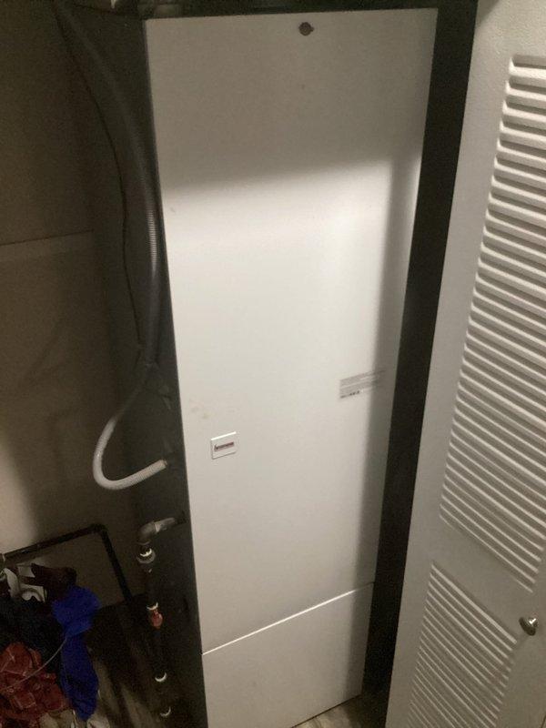 Responded to no cooling complaint on residential air conditioning system. Upon arrival, verified thermostat was calling for cooling with unit running but no cold air delivery. Inspected indoor air handler and discovered system low on refrigerant. Located and repaired refrigerant leak, evacuated system, and recharged to manufacturer specifications. Verified proper cooling operation and temperature differential across evaporator coil before departure.