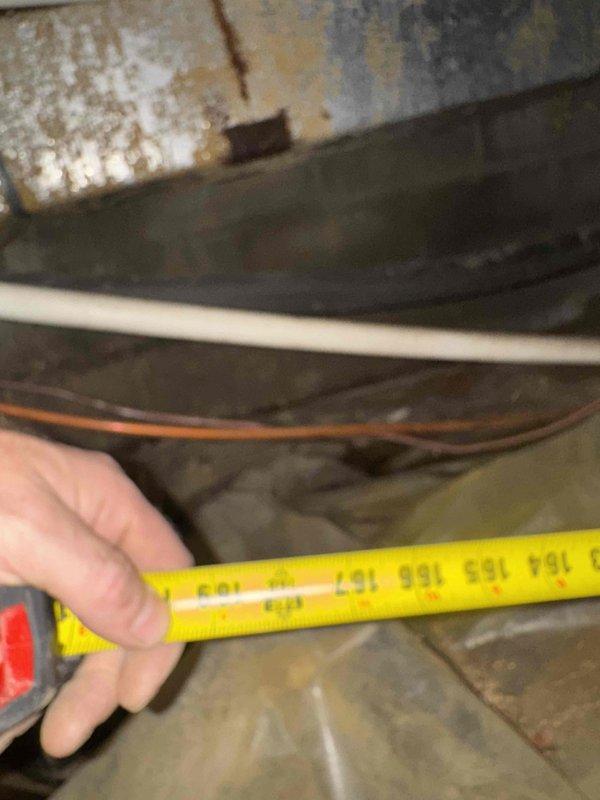 Responded to water damage caused by leaking water heater that saturated ductwork in crawl space. Assessed and measured damaged section of duct board (approximately 10x12) showing extensive moisture infiltration, rust corrosion, and material deterioration. Documented conditions and measurements for replacement of compromised duct board section and supply takeoff, with install crew scheduled to return to complete ductwork replacement.